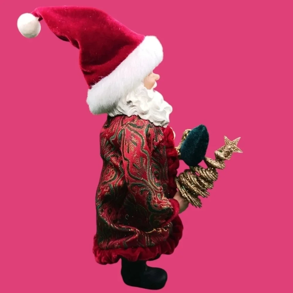 Vintage santa holding gold tree and boot